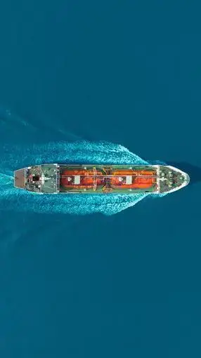 aerial top view oil ship tanker carier oil from refinery on the sea.